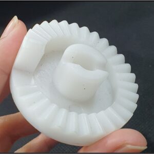 gear adjustor polishing assembly